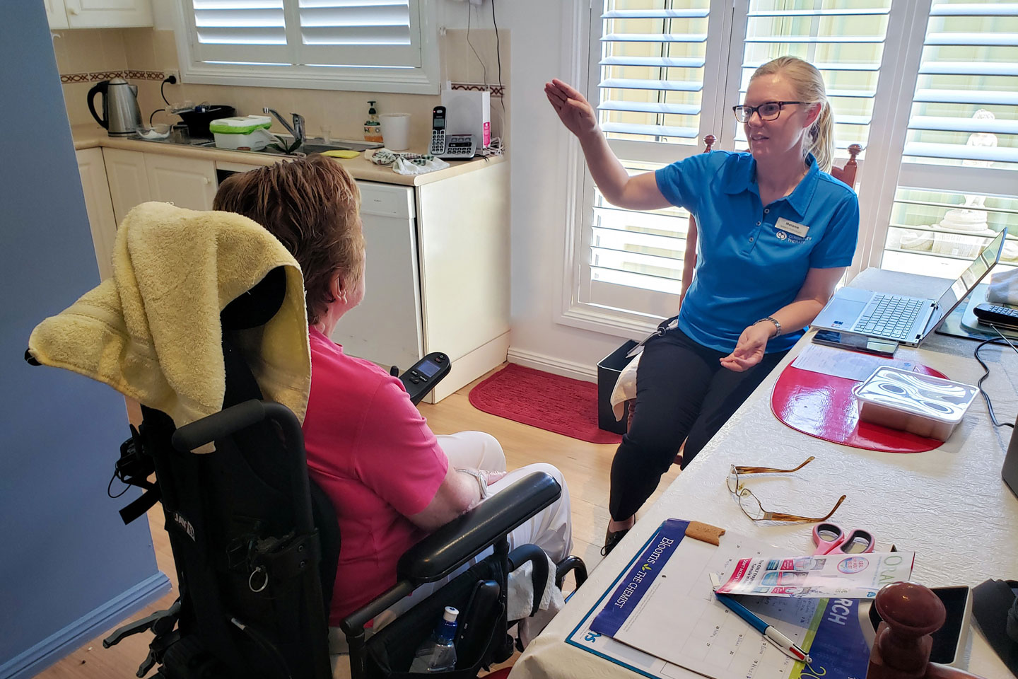 Speech Pathologist doing voice exercises with NDIS participant