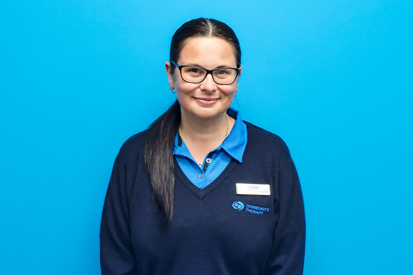 Admin team member against blue background