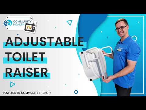 Scott holding onto a adjustable toilet raiser