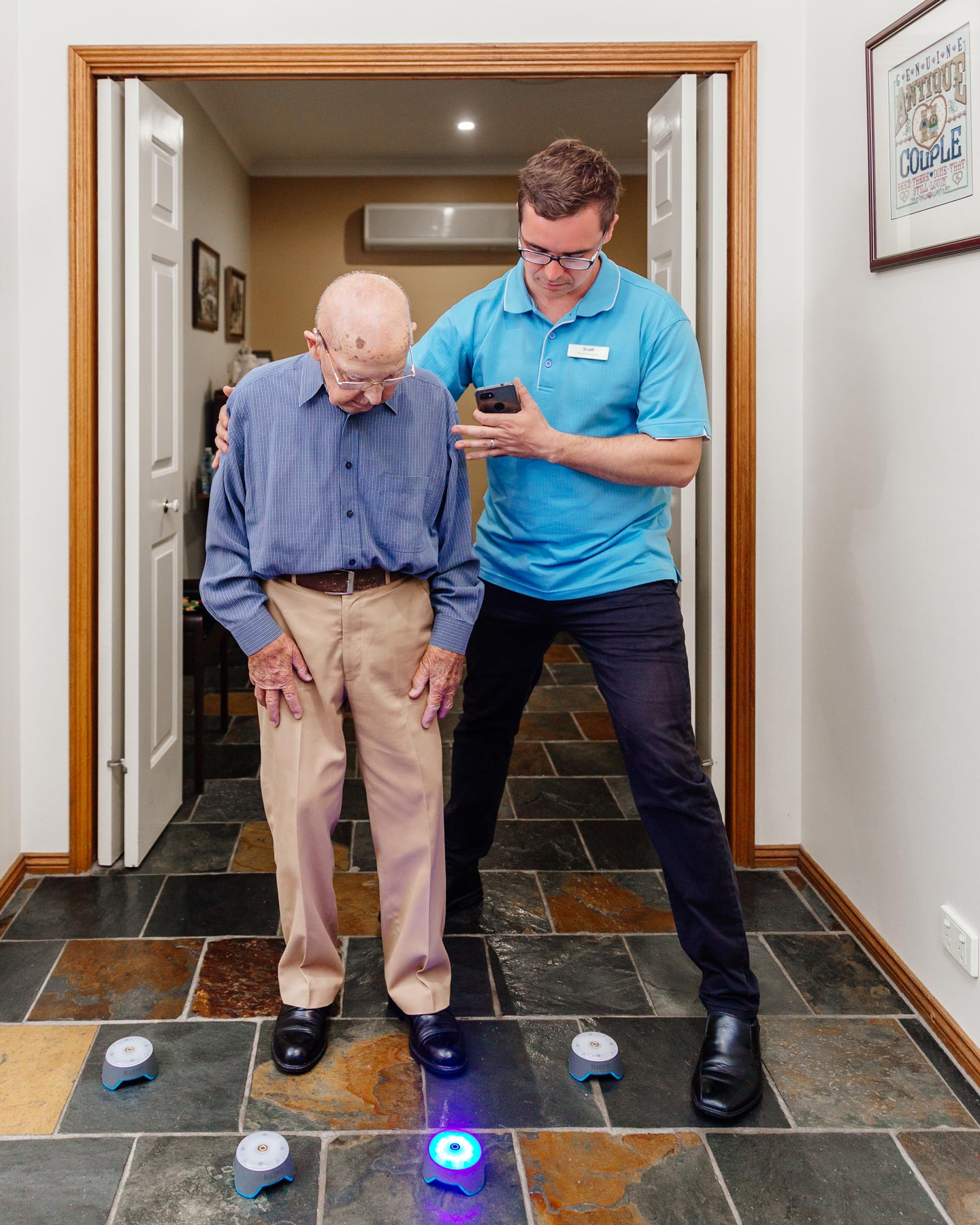 Physiotherapist supporting clinician while doing balance and coordination exercises