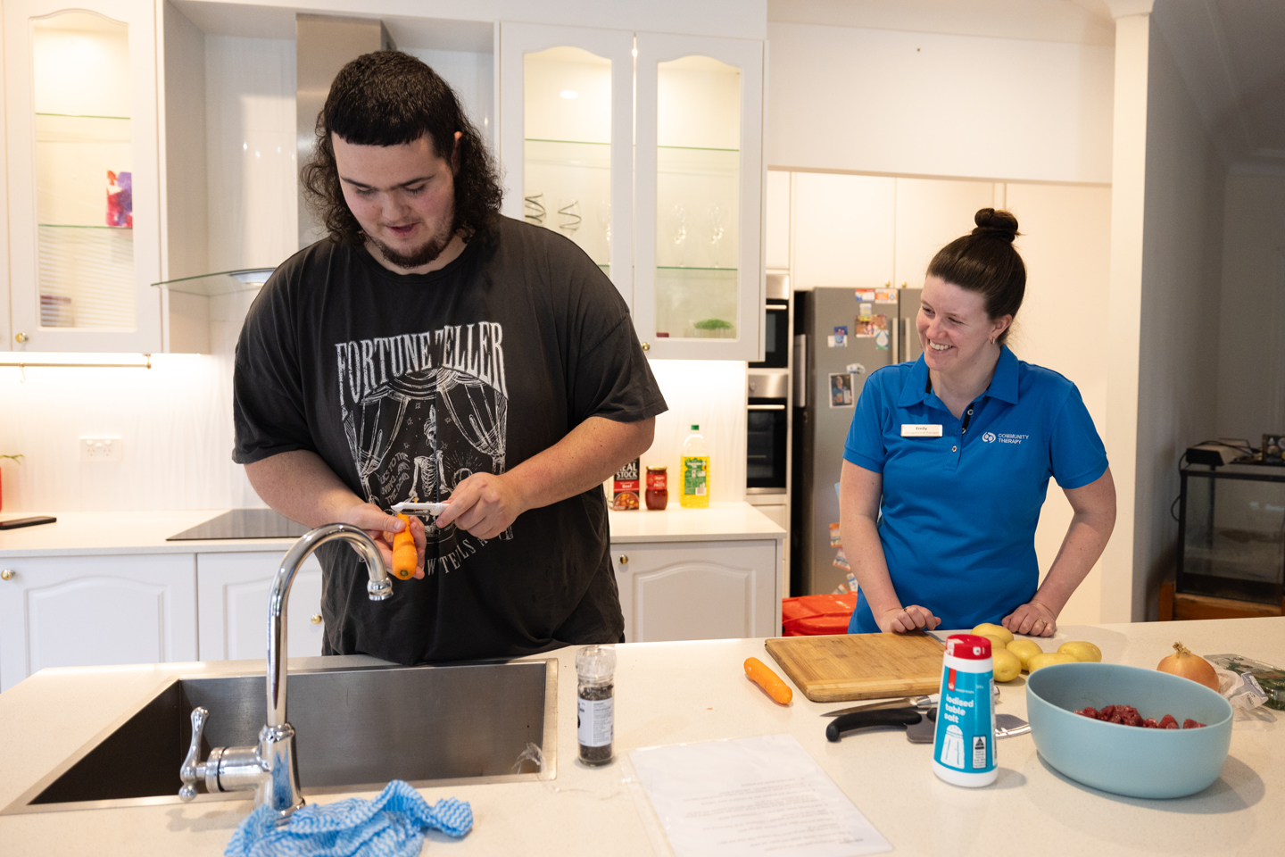 Clinician and NDIS client preparing a meal together