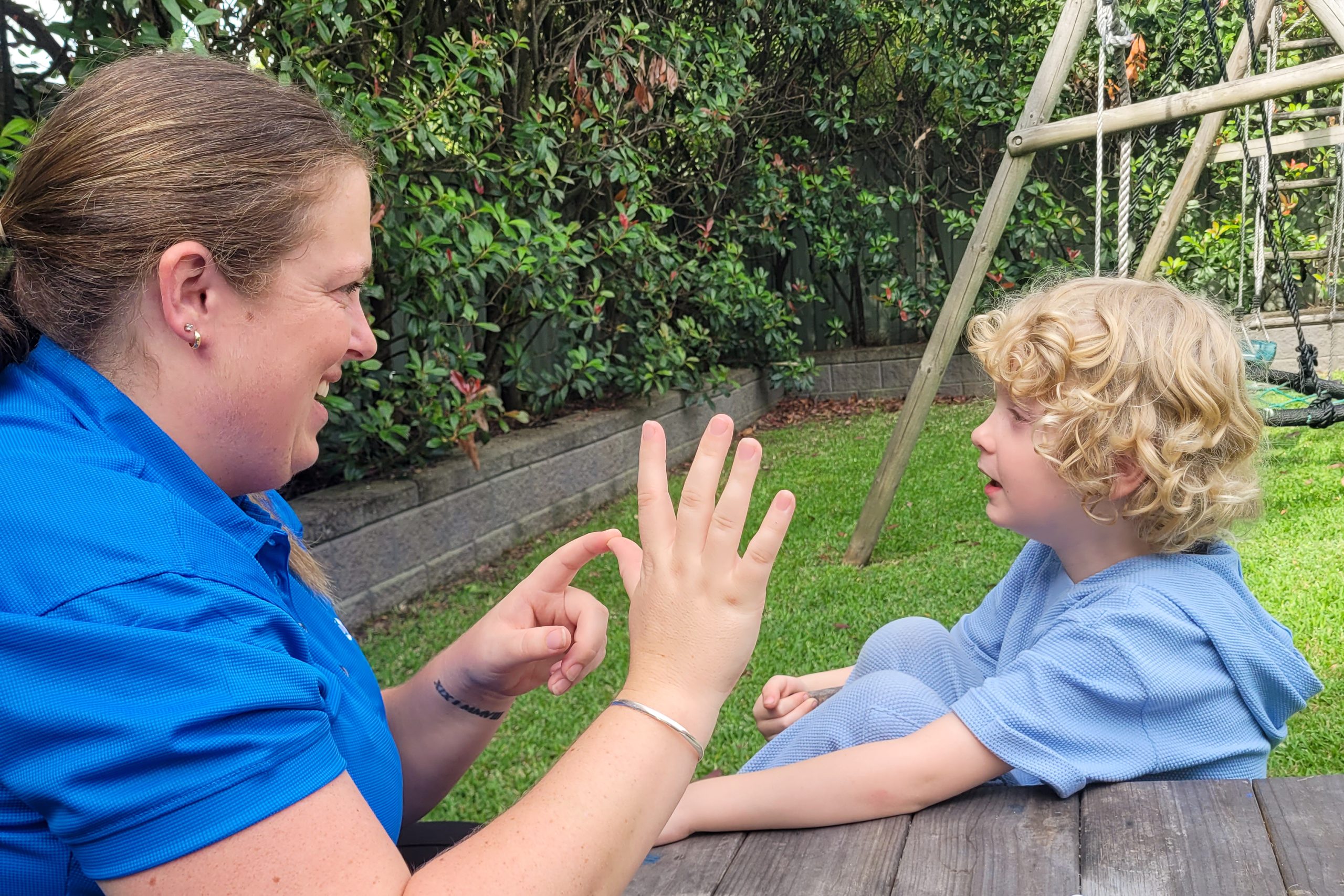 Paediatric Speech Pathologist counting with a kid